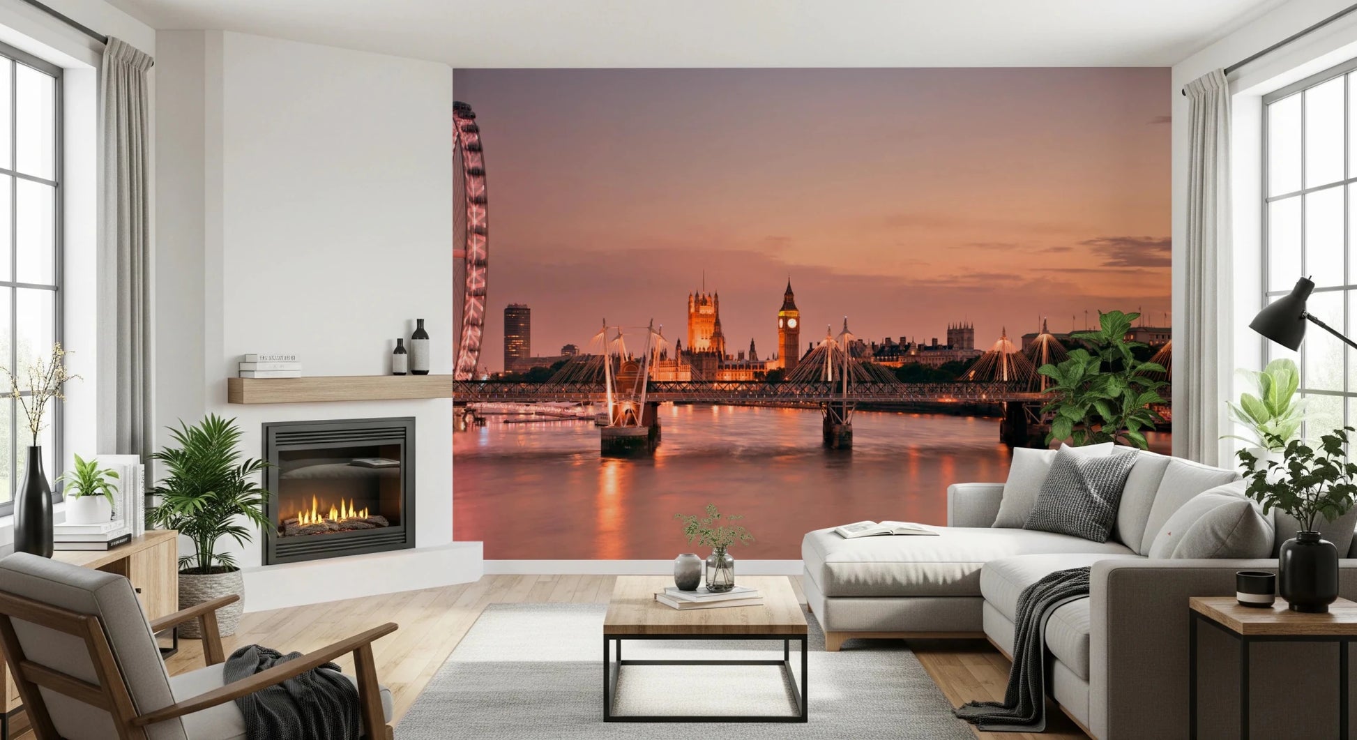 Iconic London at Dusk wall mural of the orange skyline behind a grey sectional beside a fireplace in a living room