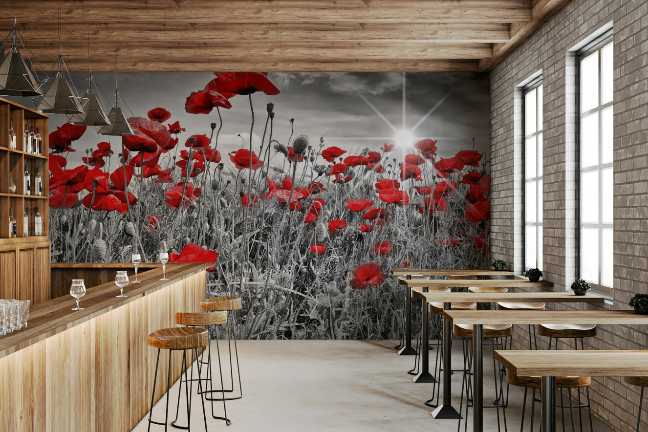 Idyllic field of poppies wall mural with bright sun


