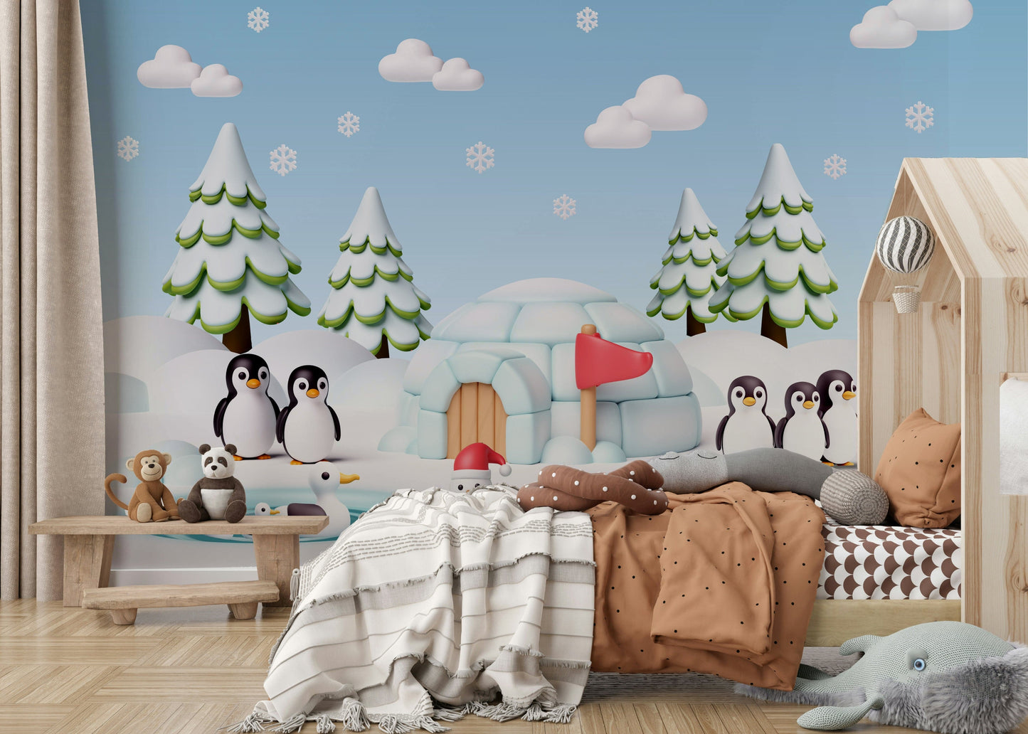 A cheerful wall mural with a whimsical, arctic design.

