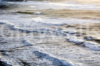 A tranquil endless ocean mural on the wallpaper.


