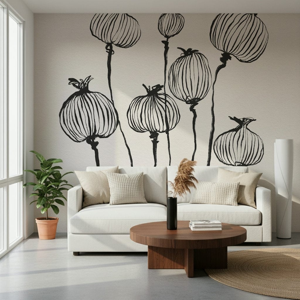 Ink Poppy Pods wallpaper mural with sketched poppy pods behind a white sofa and walnut round coffee table