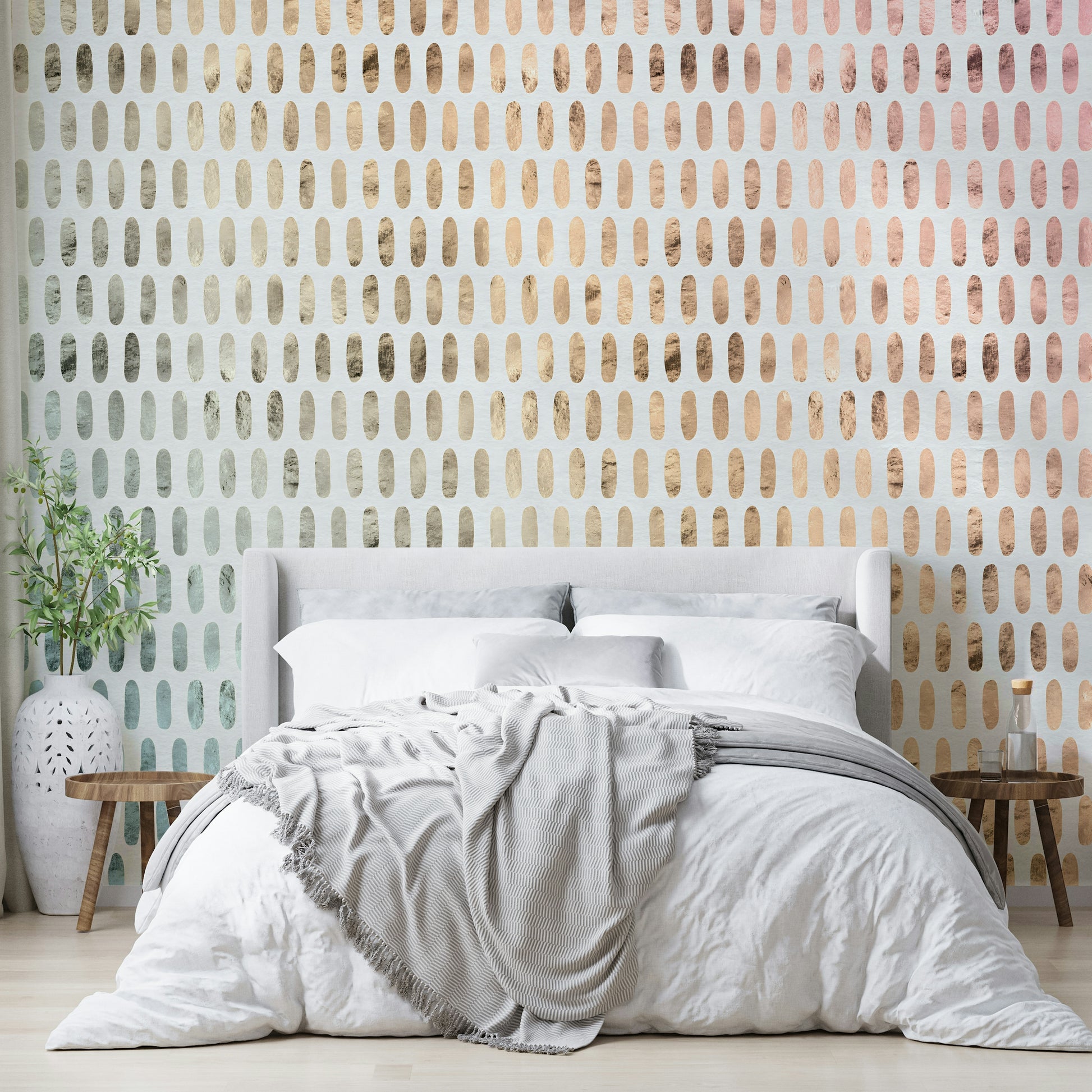 Subtle shimmer of iridescent ovals on soft white wallpaper.

