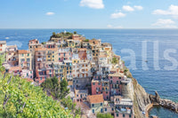 Italian coastline charm mural featuring gentle watercolor wallpaper effects