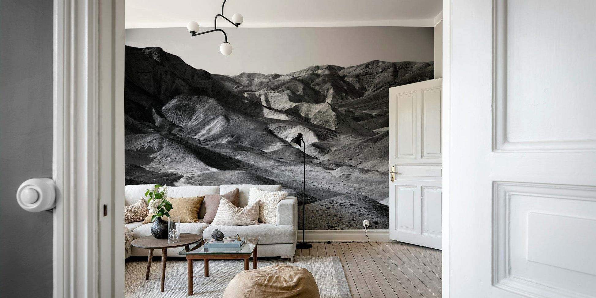 A graceful subtle mountain wall mural in warm, natural tones.

