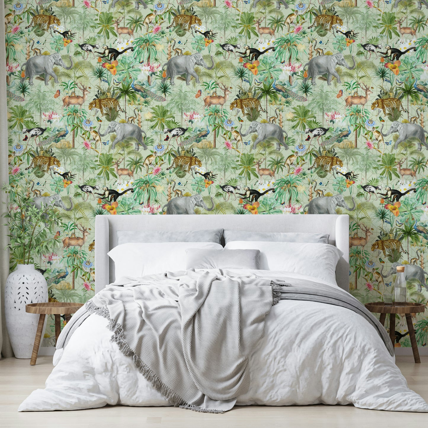 Close-up of tropical plants and exotic flowers in Jungle Opulence wallpaper.

