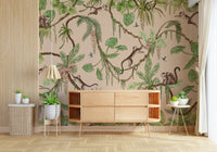 Vibrant wall mural featuring jungle animals playing amid dense foliage