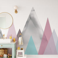 Scandi-style mountain wall mural featuring minimalist grey and white hills.