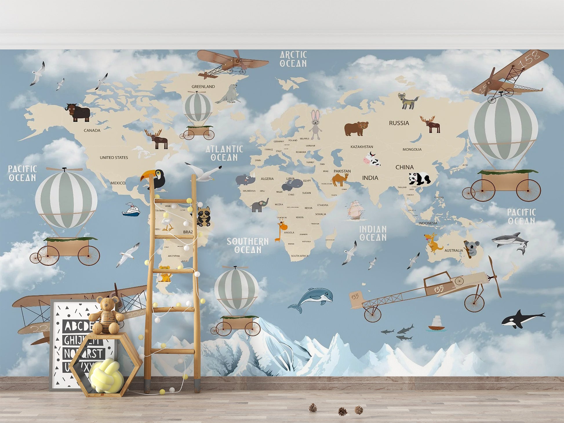 Children Room Wonderland World Map wallpaper mural styled as a living room feature wall behind a sofa and seating