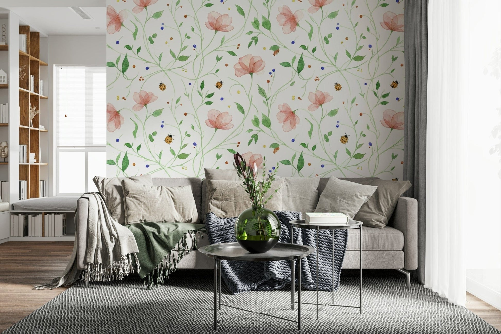 Large scale botanical mural behind a neutral sofa in a city apartment.
