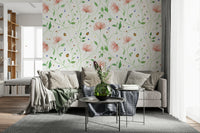Large scale botanical mural behind a neutral sofa in a city apartment.