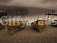 Old-world wallpaper showcasing lakeside boats and a muted sepia color palette for a timeless feel.