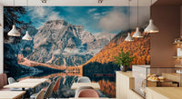 Lake Braies Serenity wallpaper mural of grey peak and amber forest in a cafe with pendant lights, tables and a pastry counter