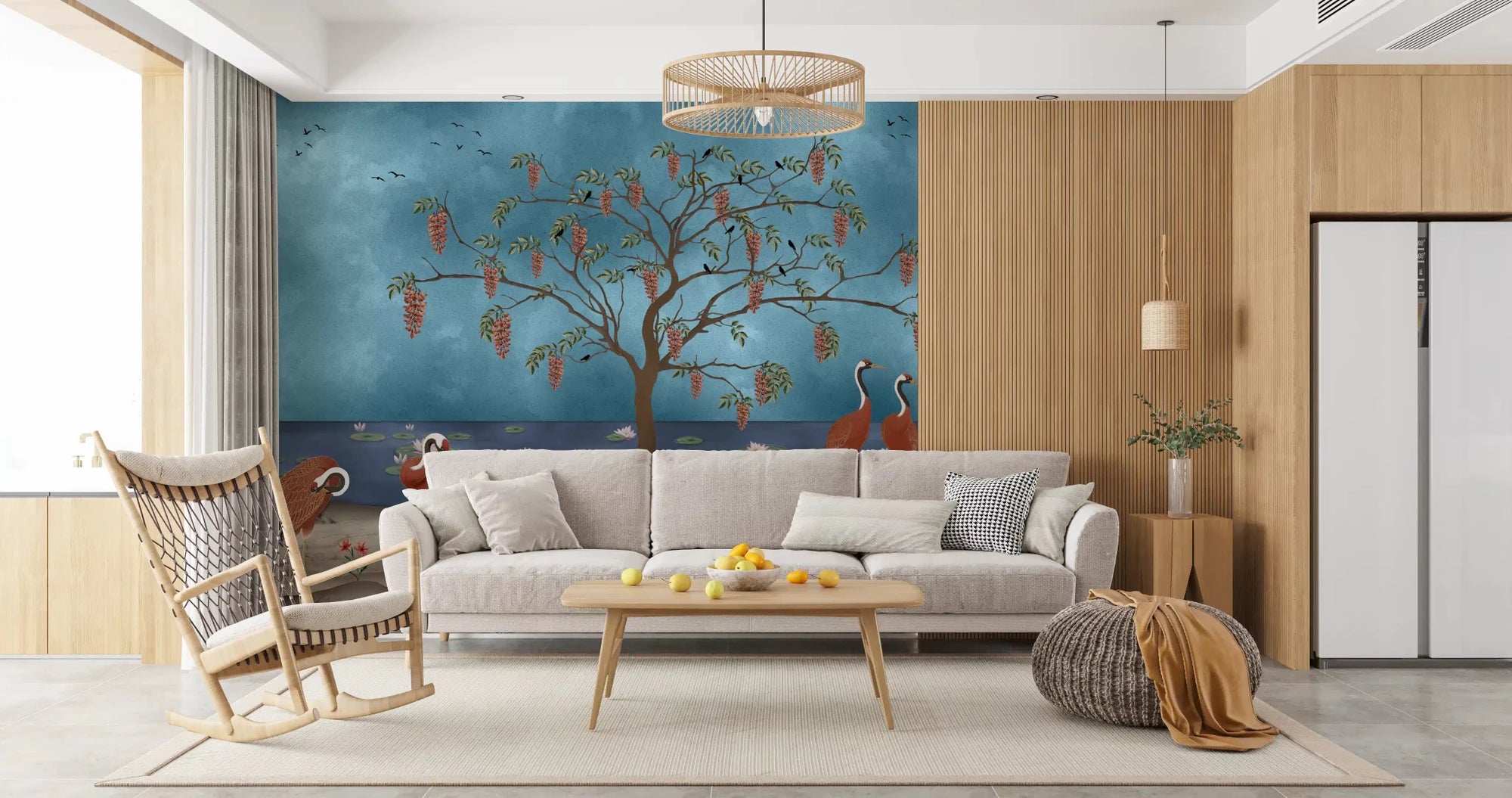 Cranes and Wisteria wall mural styled behind a modern living room sofa