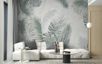 Large Gray Green Palm Leaves wallpaper mural as a bedroom feature wall behind the headboard in green tones