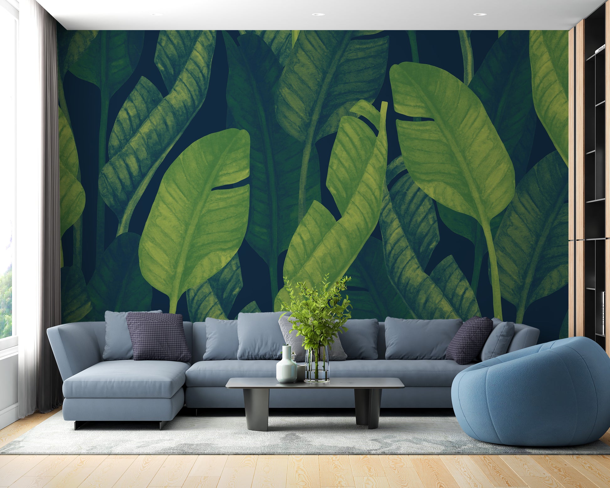 Deep Green Banana leaf wallpaper mural styled as a feature wall behind a dining table and chairs in green tones