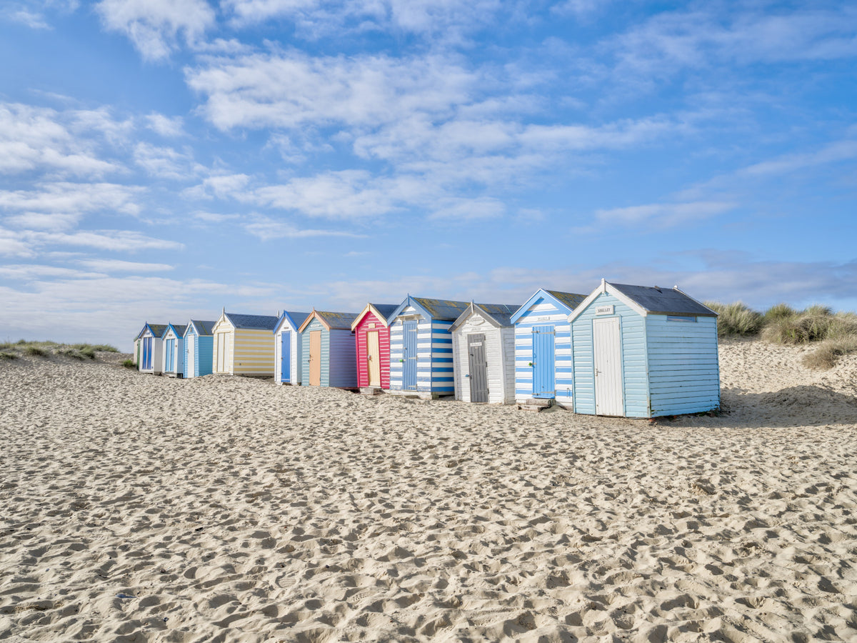 Vibrant Coastal Sheds Wall Mural in your room