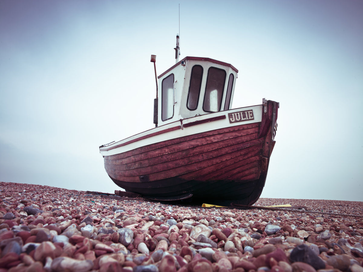 Boat Resting on Pebbled Strand Wall Mural in your room — zoomed