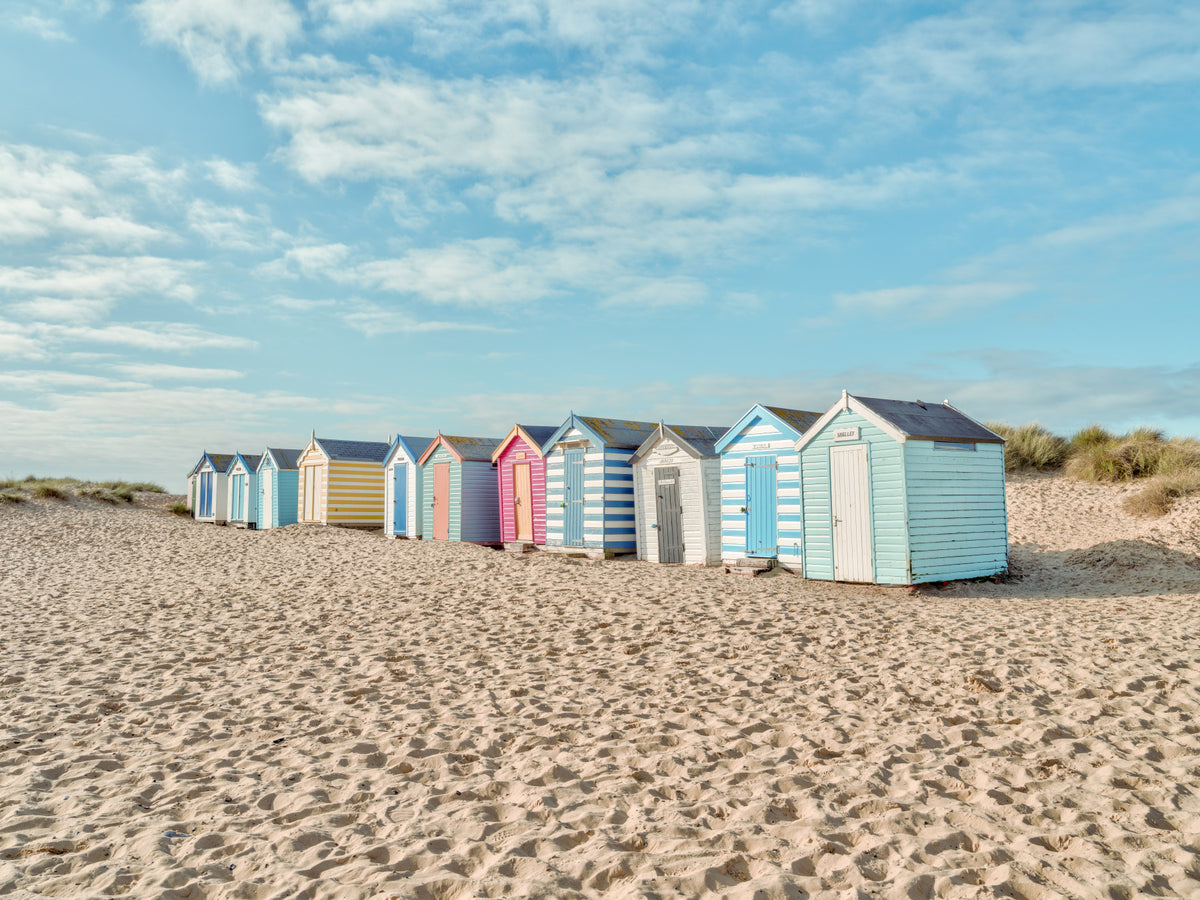 Beach Huts on the Shore Wall Mural in your room