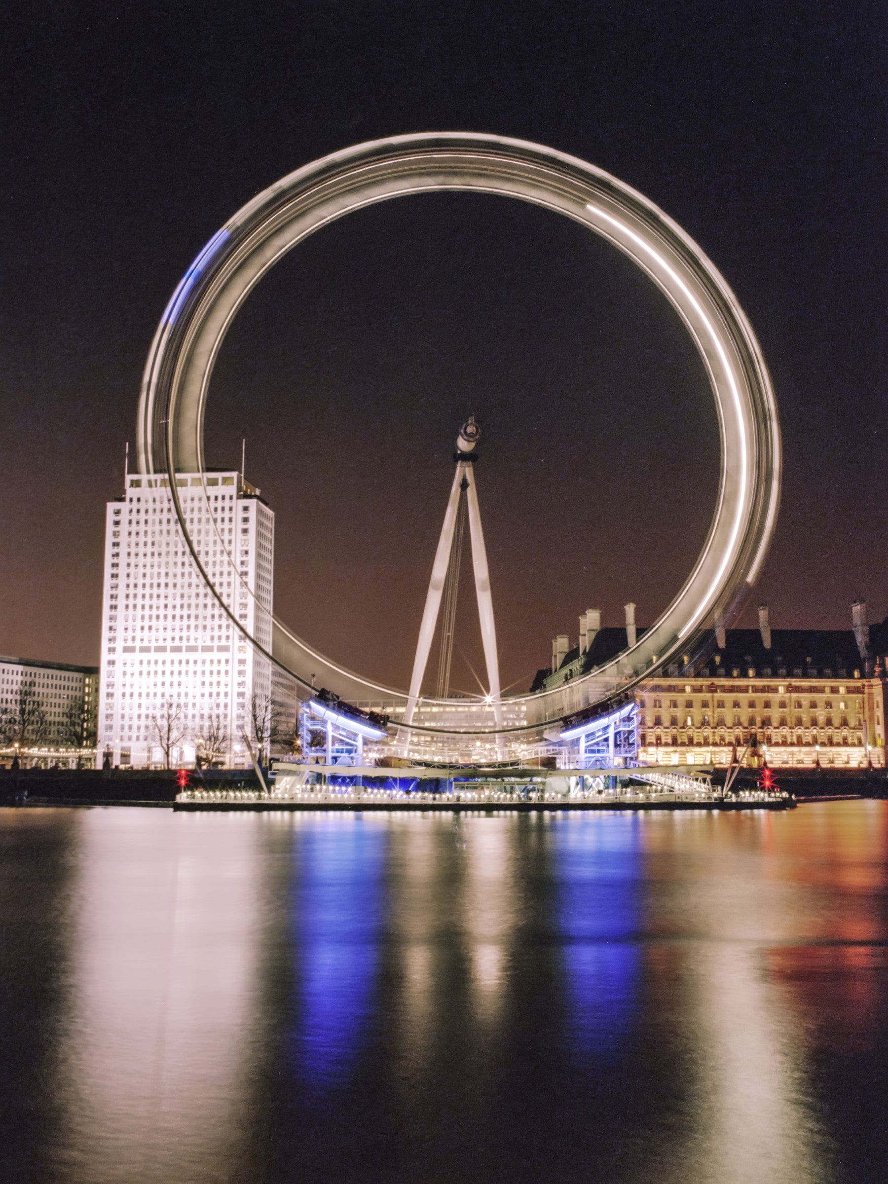 Night-lit London Eye scene anchors a dining room as a Timeless Night Spin wall mural