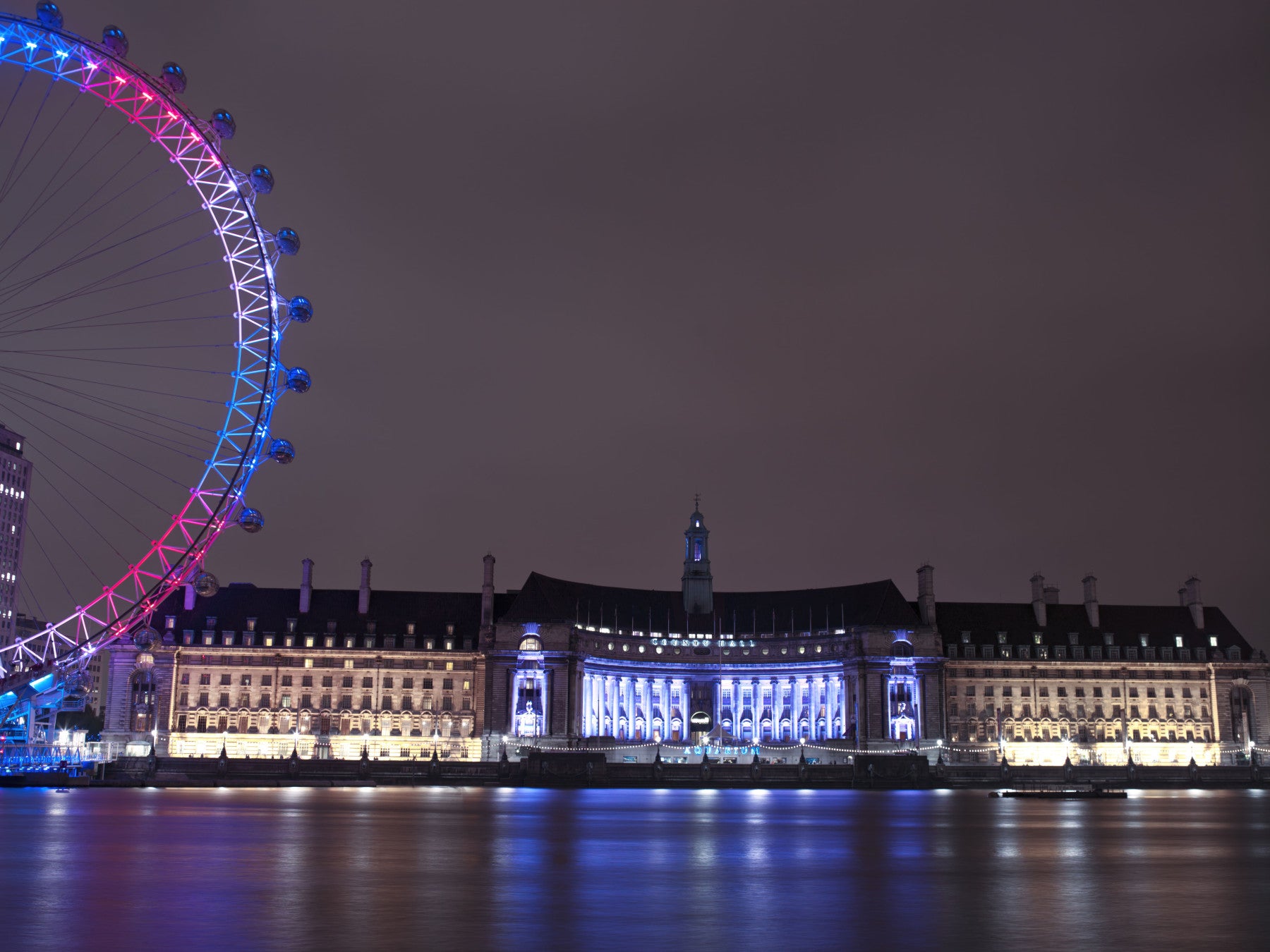 London Eye magenta arcs above the dining room with this Embankment wall mural