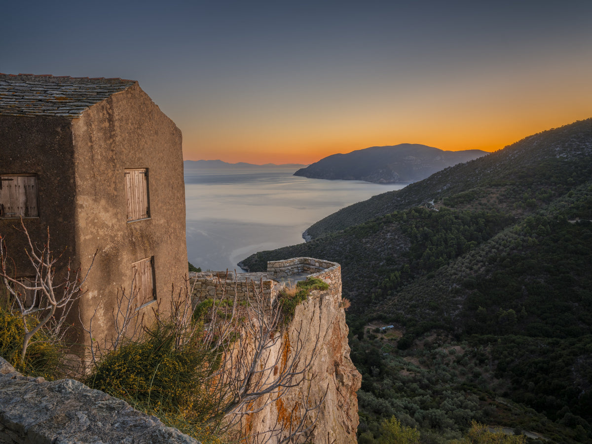 Rustic Stone Retreat at Golden Hour Wall Mural