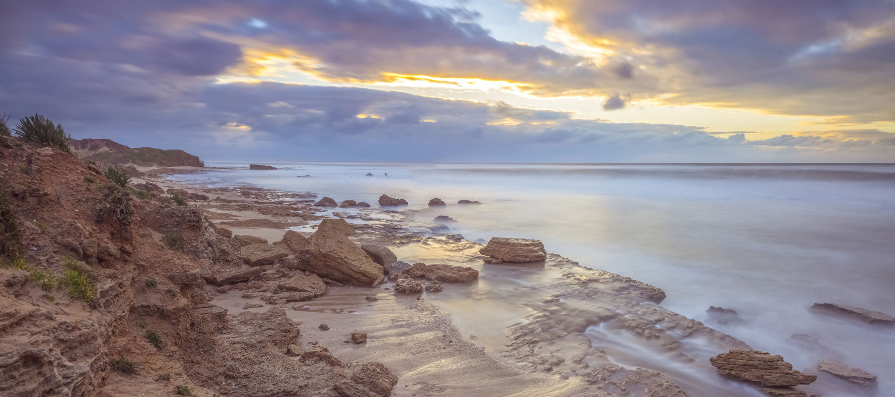 Twilight Shoreline Rocks Wall Mural in your room — zoomed
