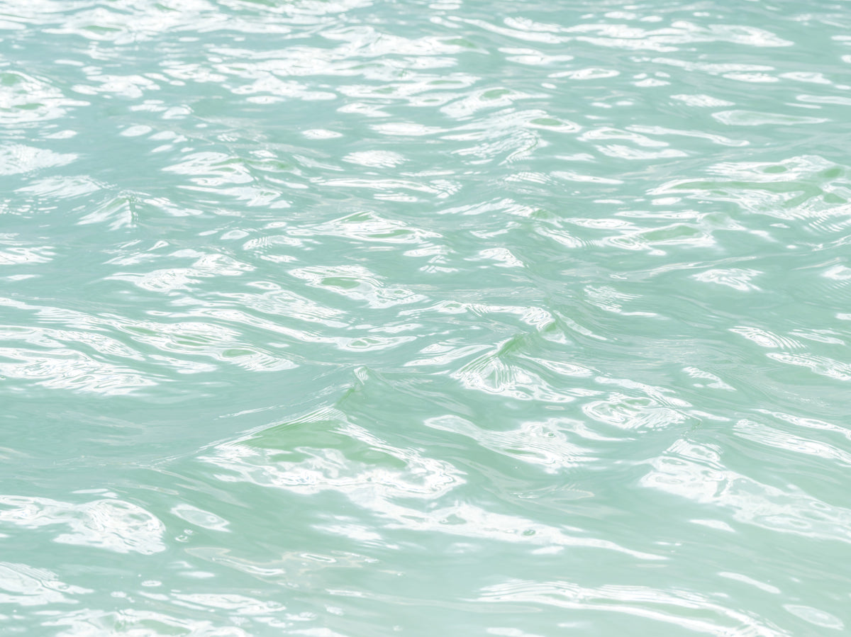 Serene Mint Water Ripples Wall Mural in your room — zoomed
