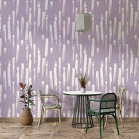 Purple and white brushstrokes on a wall

