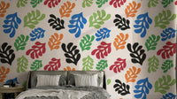 The design features various types of leaves and plants.


