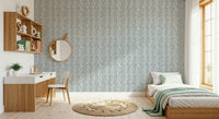 Vertical leaf patterns on calming slate blue background.