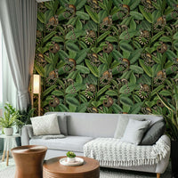 The foliage is lush, with various types of leaves, especially those from a ficus tree.
