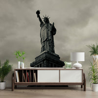 Monochrome Statue of Liberty mural behind console table, modern entryway wall decor