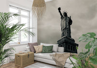 Black and white city-themed mural in studio apartment, modern wall decor, clean lines