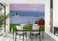 Wall mural Lofoten Coastal Escape; green field, fjord view, dramatic sky.