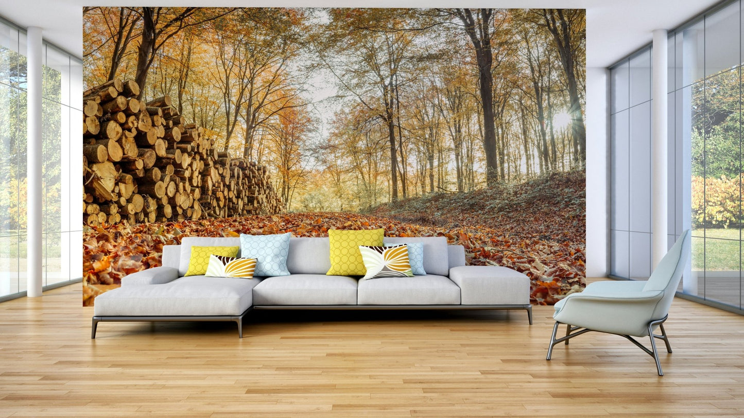 Stacked logs mural in woodland setting

