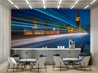 The image shows a full wall with bright light trails from moving vehicles.

