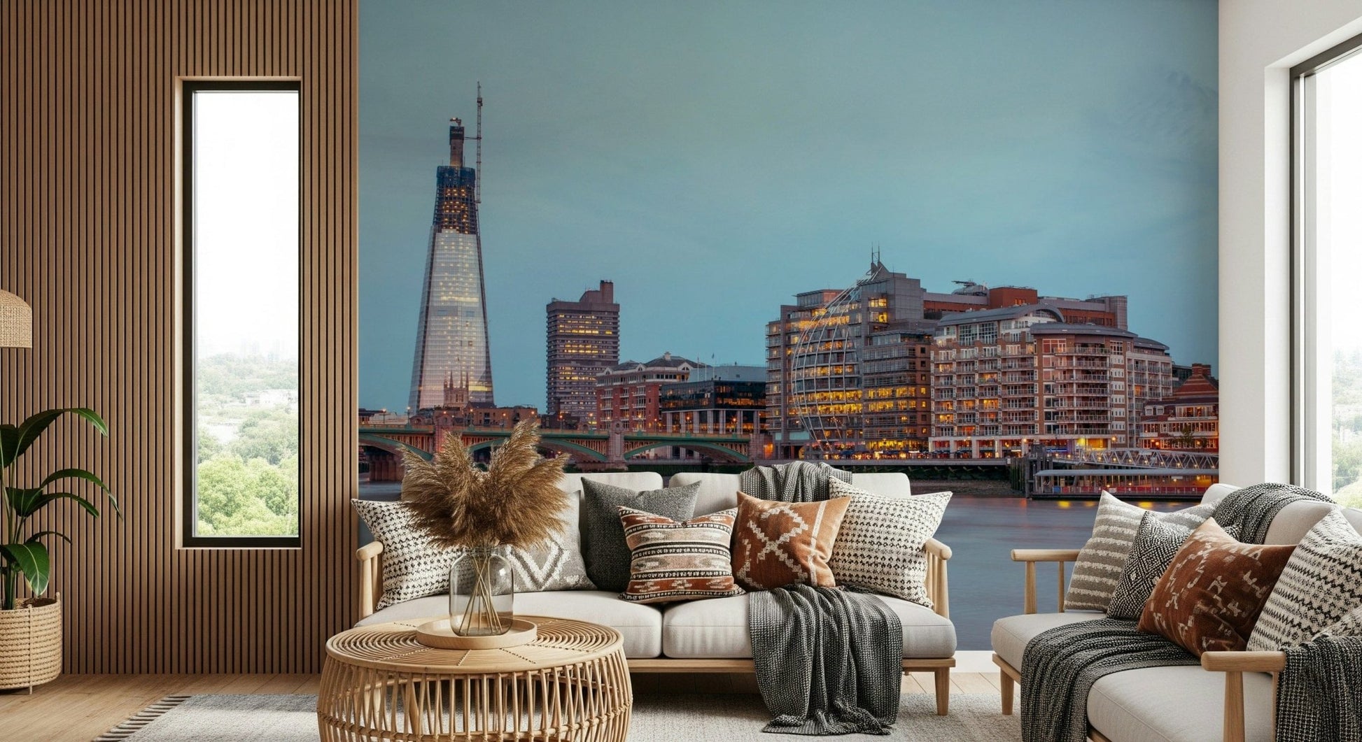 London Luminescence wallpaper mural of The Shard and Thames behind two cream sofas with pampas in a living room