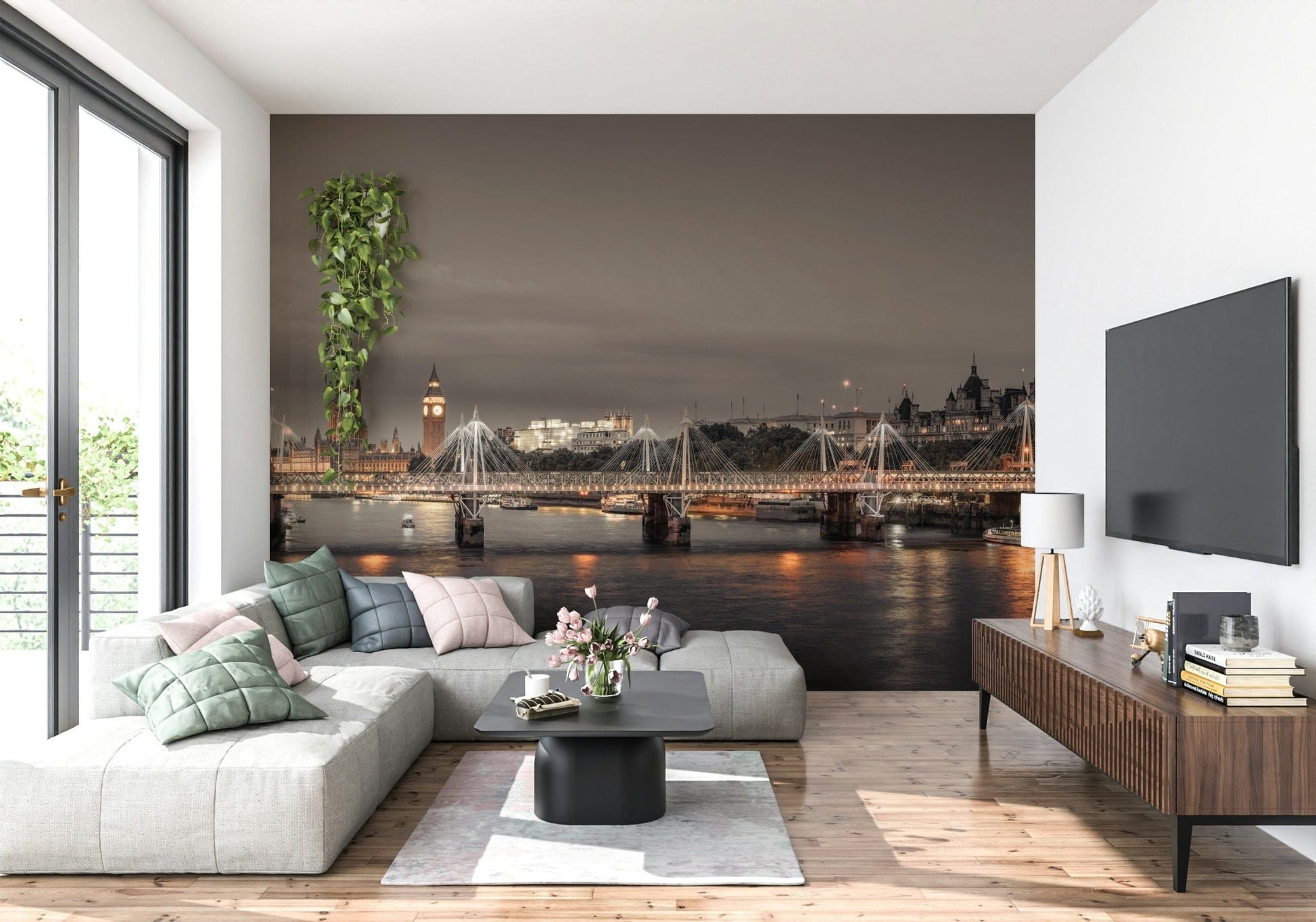 London's Nightfall wallpaper mural of the dusk Thames behind a grey sectional and wall-mounted TV in a living room