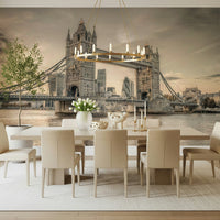 London's Tower Bridge wallpaper mural in sepia in a dining room with a brass ring chandelier and tulips