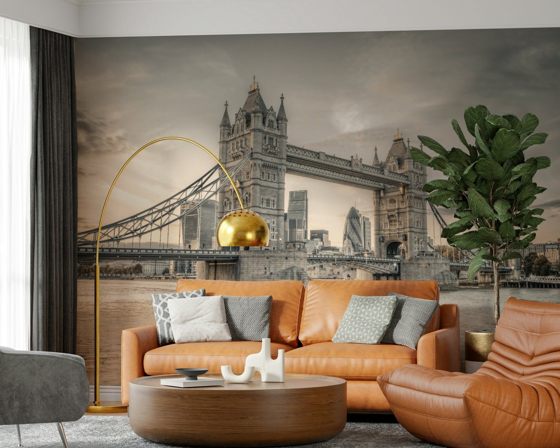 London's Tower Bridge wallpaper mural in sepia behind a tan leather sofa with a gold arc lamp