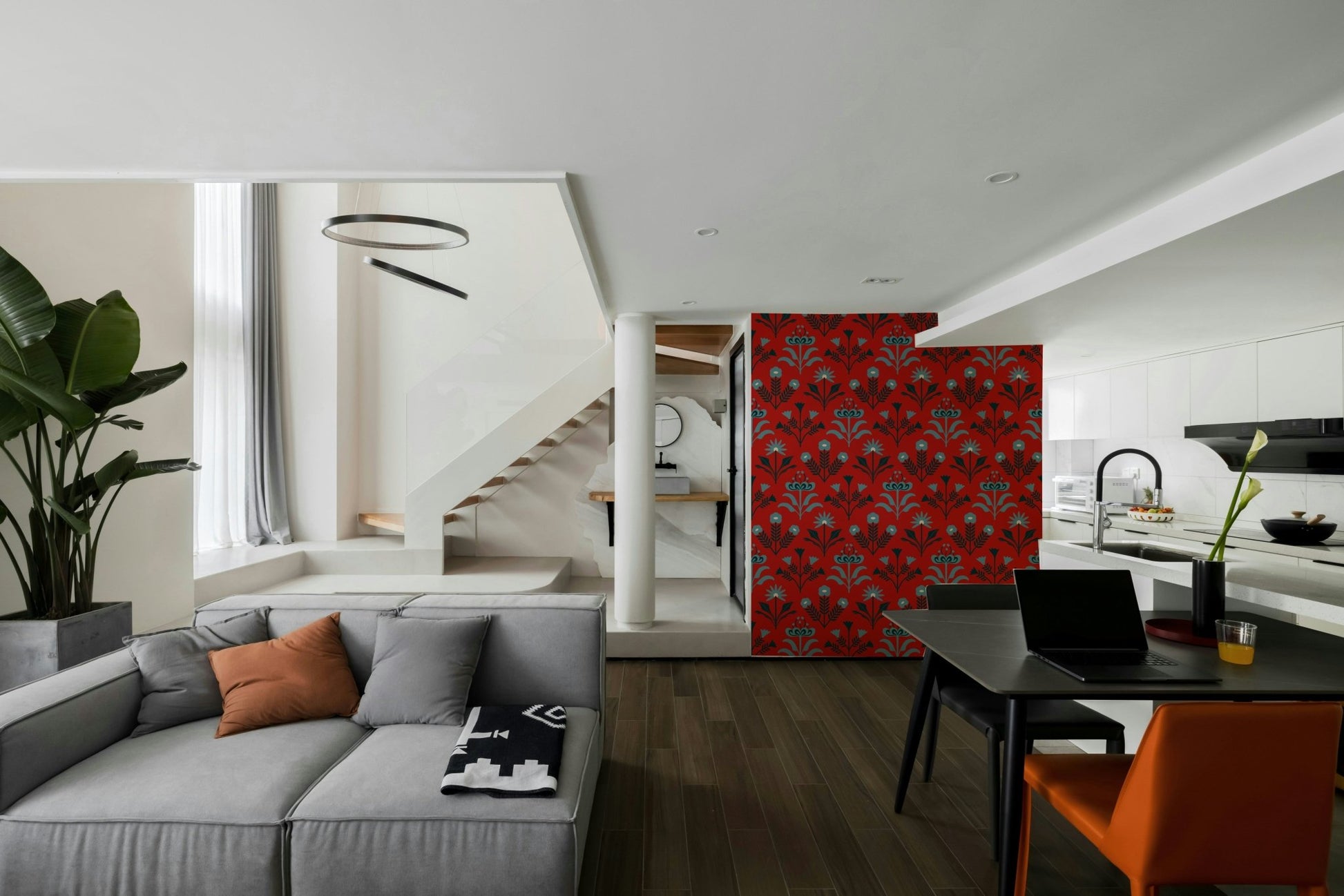 A sophisticated and eclectic floral wallpaper pattern.
