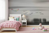 Wallpaper depicting a serene night scene with a full moon and flying silhouettes.