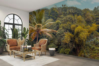 The foliage is dense with various shades of green and yellow.

