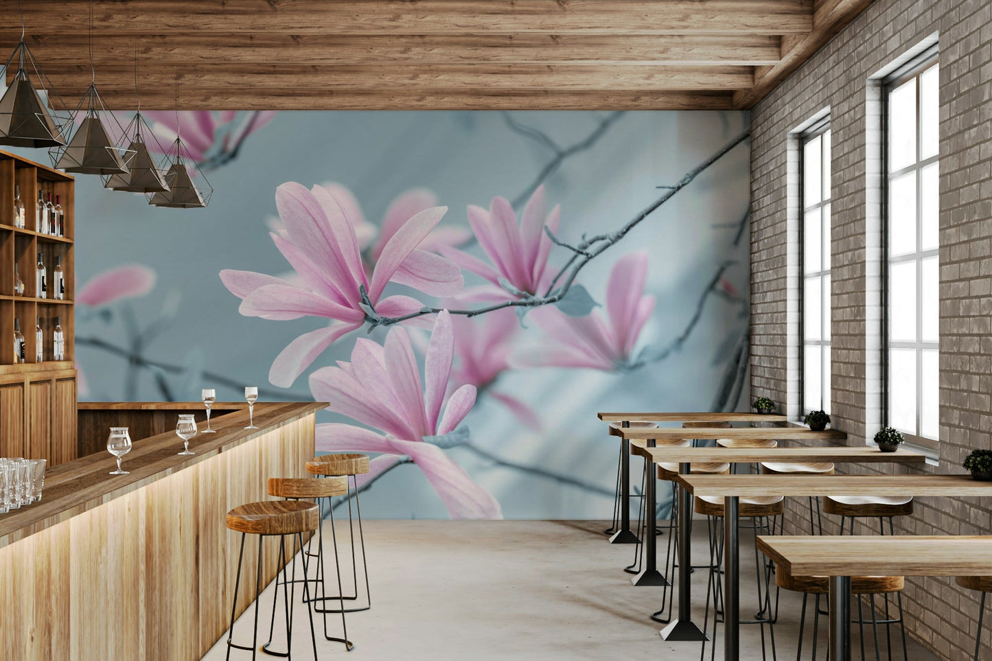A wall mural of a painting of magnolia flowers.

