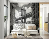 Large bridge architecture wallpaper for a feature wall in a sunlit office.