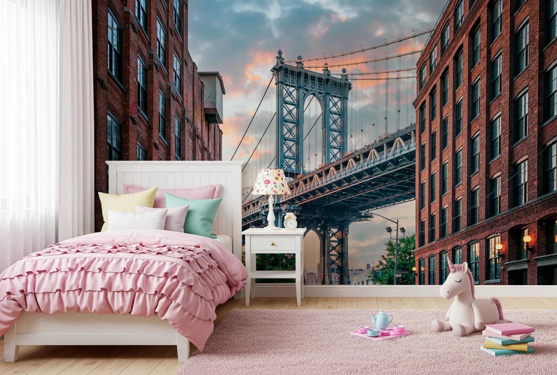 Manhattan Bridge Vista wallpaper mural of the DUMBO bridge view behind a pink ruffled bed in a girls bedroom