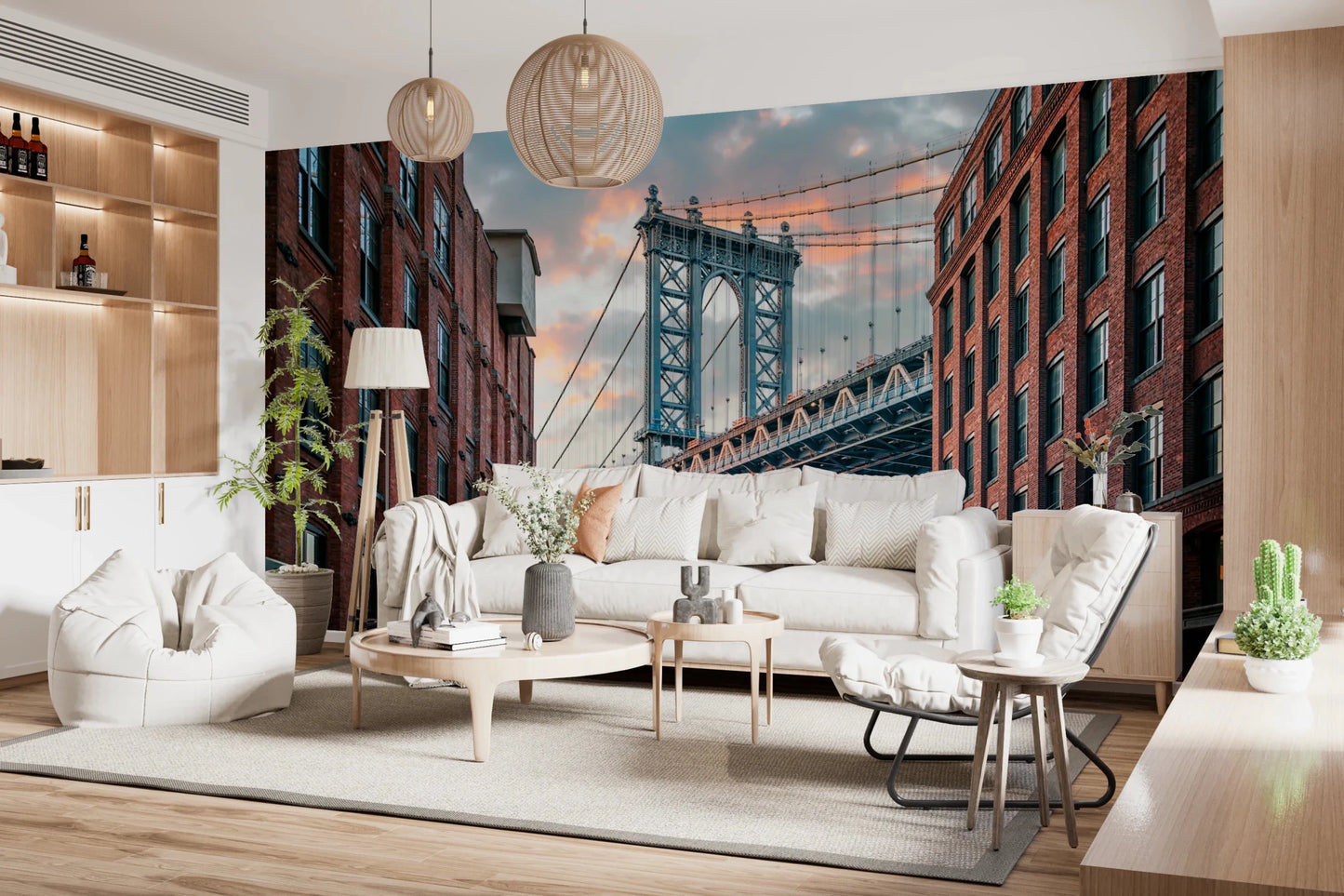 Manhattan Bridge Vista wallpaper mural of the bridge at sunset behind a white sofa and beanbag in a living room