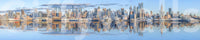 Detailed skyscraper architecture reflected in a serene waterfront mural

