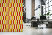 Marigold and Maple wallpaper on a partition wall in an open-plan office with desks and cage pendants