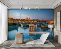 The mural gives a feeling of being in a classic Mediterranean village.

